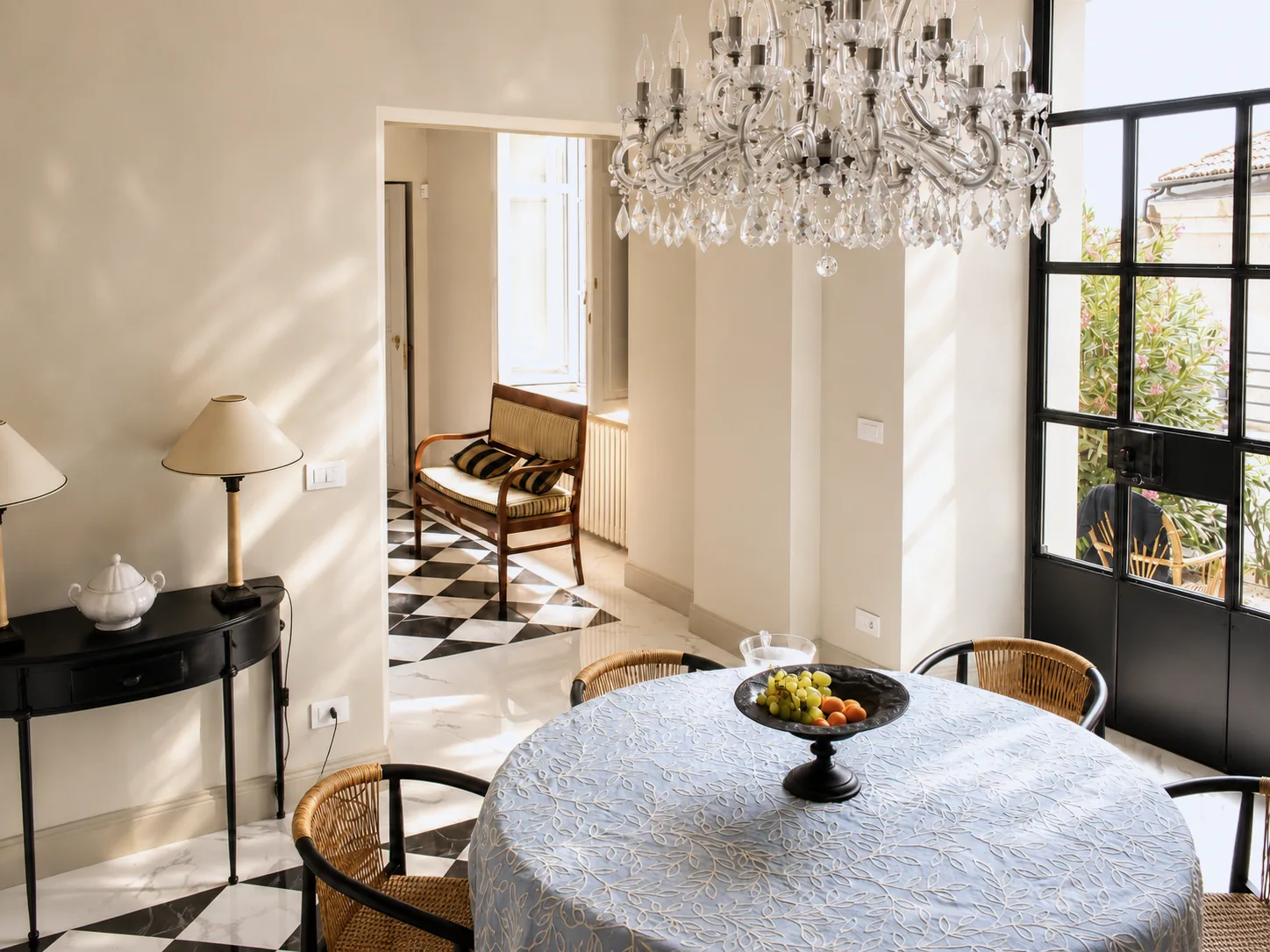 Light-filled dining room opening onto the garden