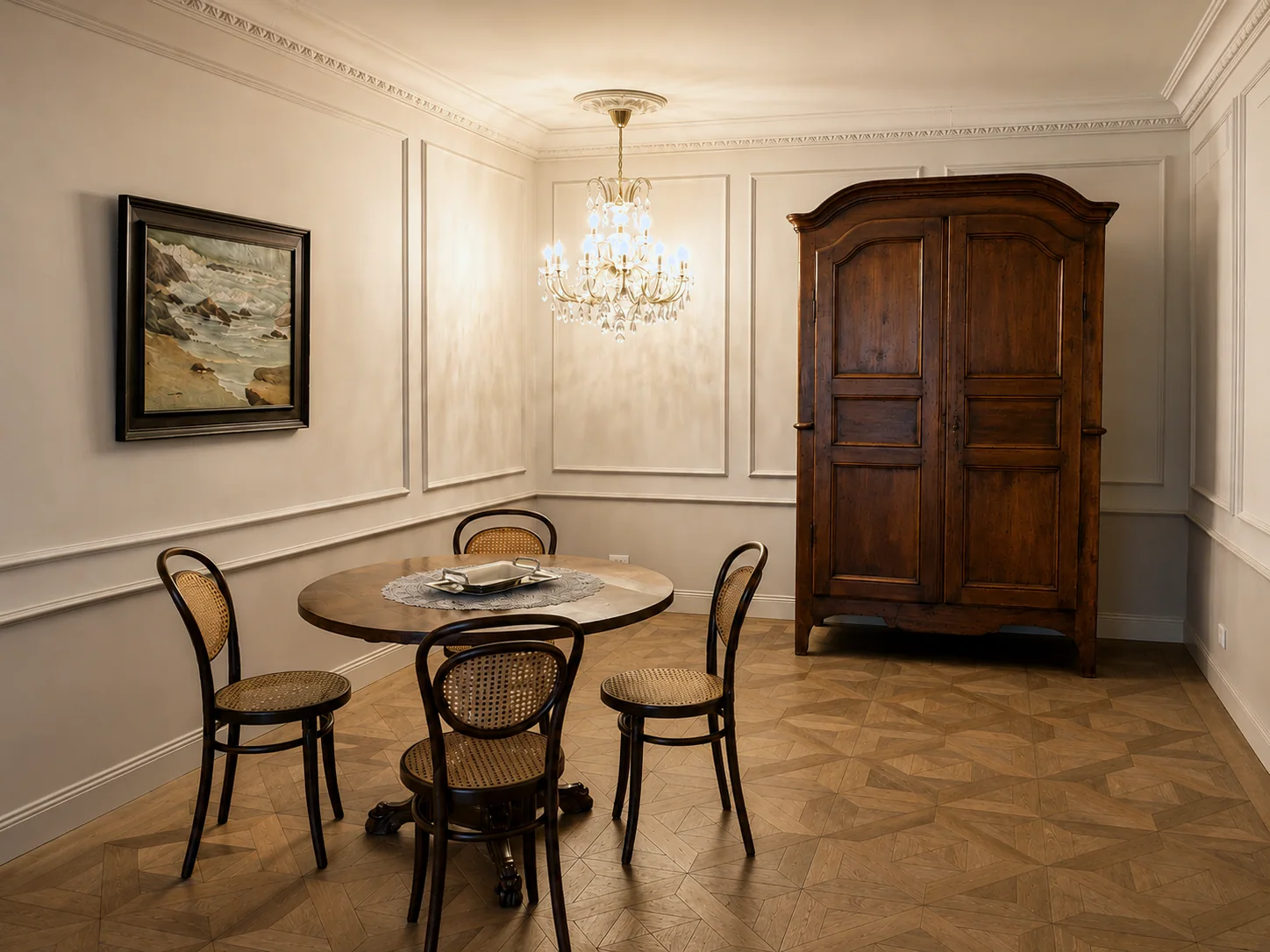 Study with parquet floor, round table and antique cabinet